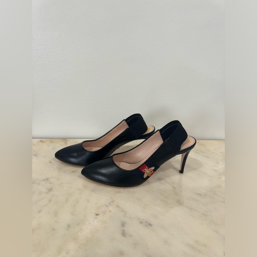 BrandNew Gucci Sylvie leather pump with black webbing and golden bee embroidery.